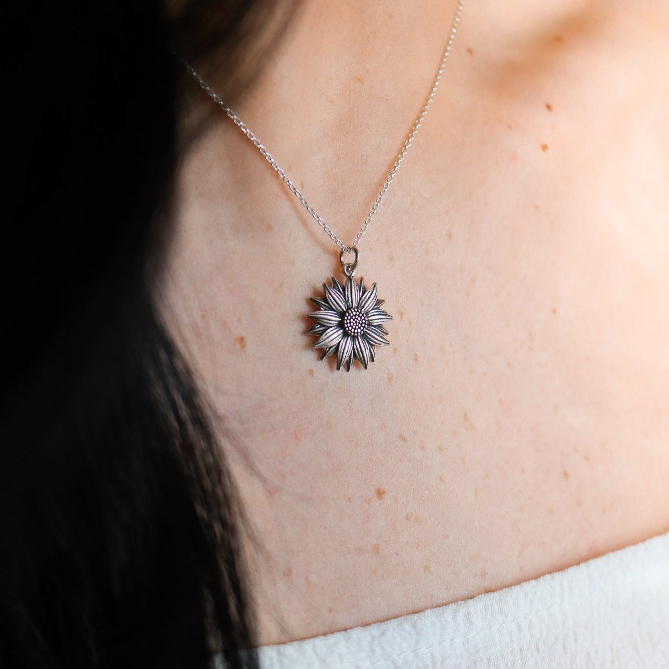 James Avery Artisan Jewelry - The Wild Sunflower Pendant in bronze and sterling  silver pairs perfectly with this changeable necklace and a turquoise bead.  https://bit.ly/3urNUId 📷: darlenemariedavila | Facebook