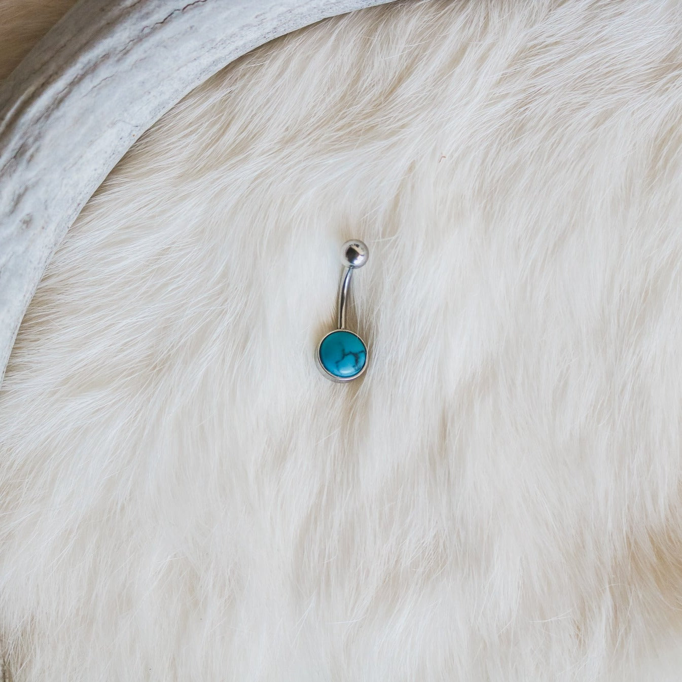 Teal belly shop button ring